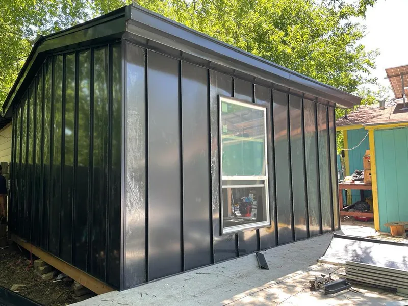 Black standing seam metal wall panels for Roof Inspection in Bell