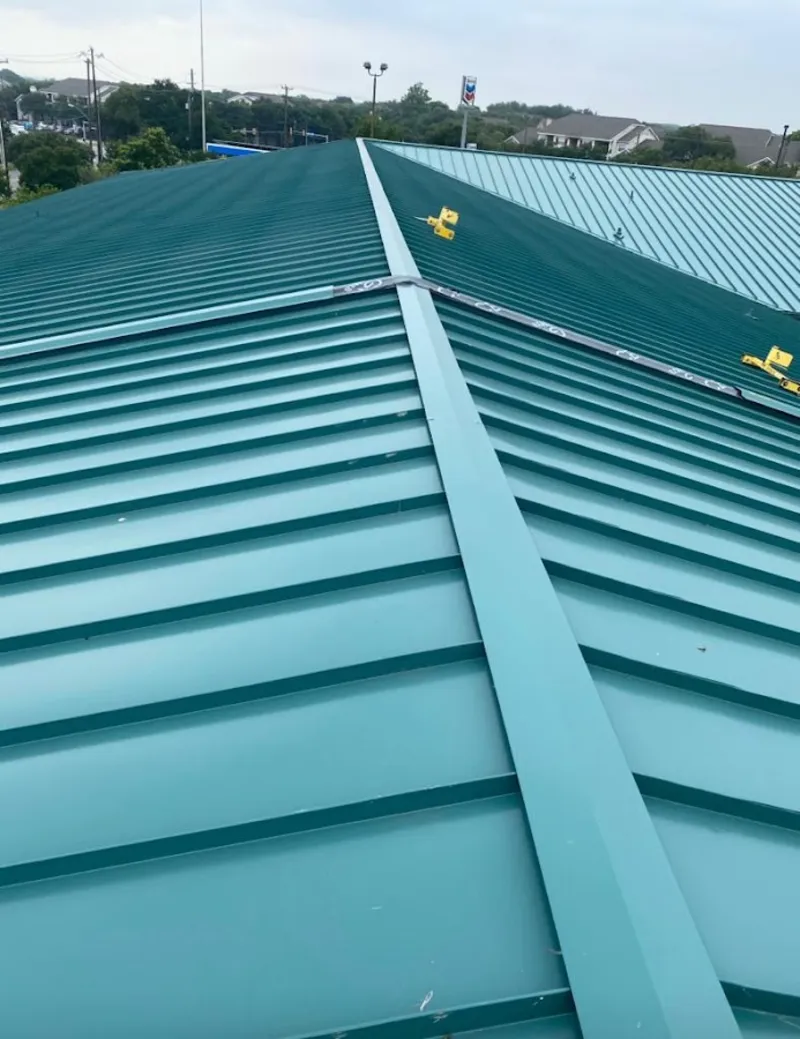 Green commercial metal roof ridge and valley for Metal Roof Repair in Bell