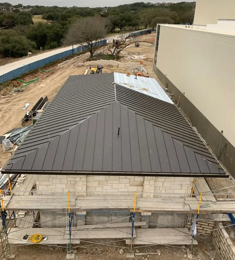 Metal roof new construction with scaffolding in Bell